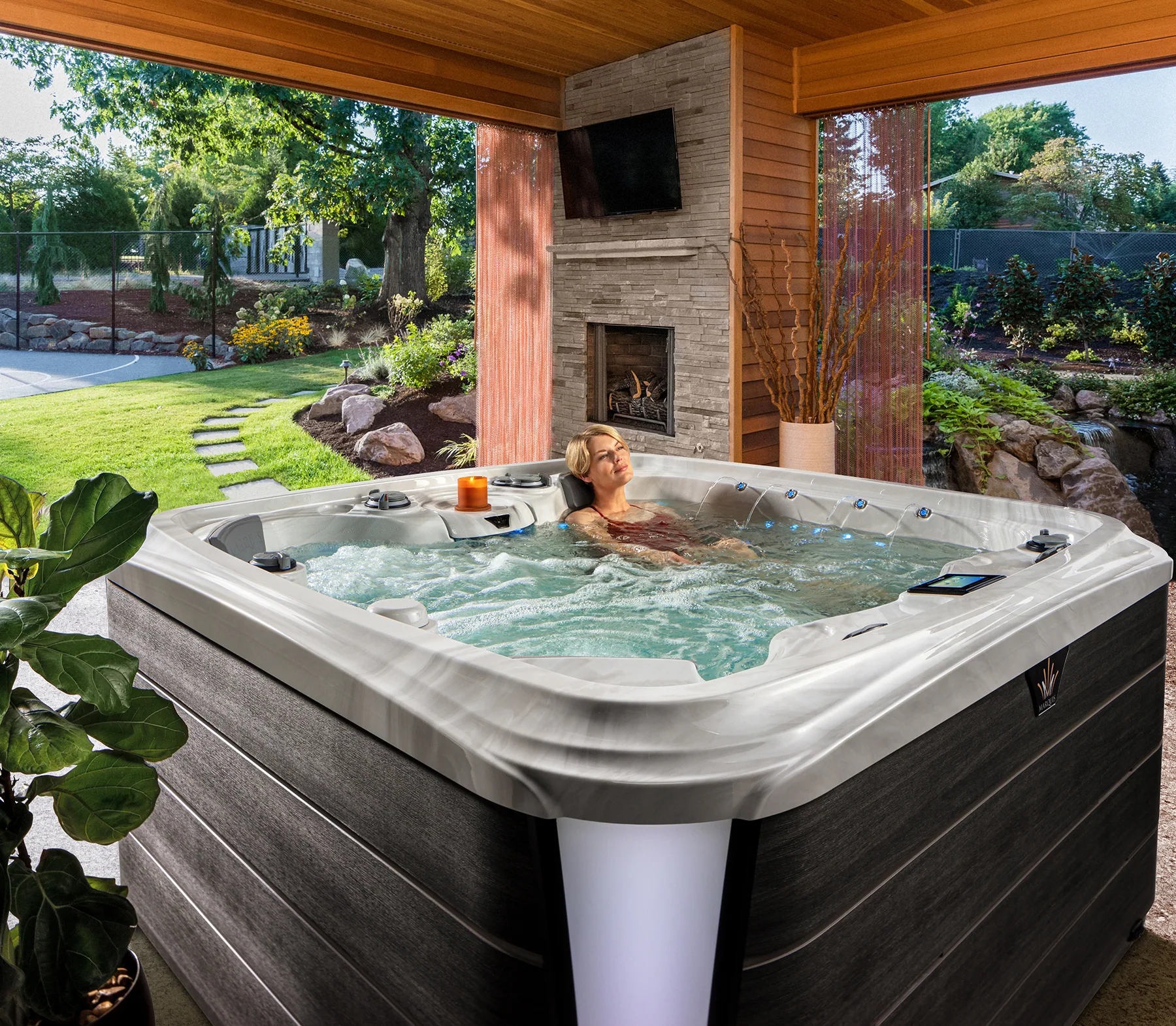 Filled hot tub on a covered patio